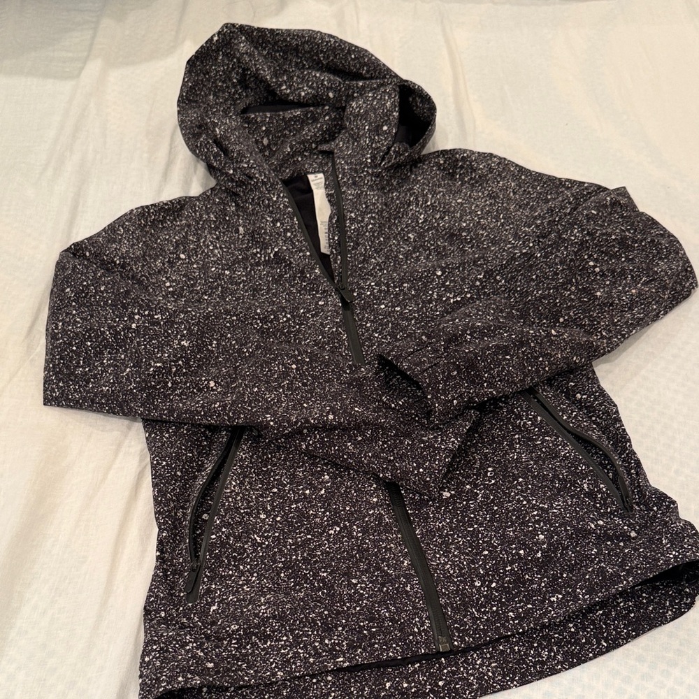 Lululemon Black and White Speckled rain jacket